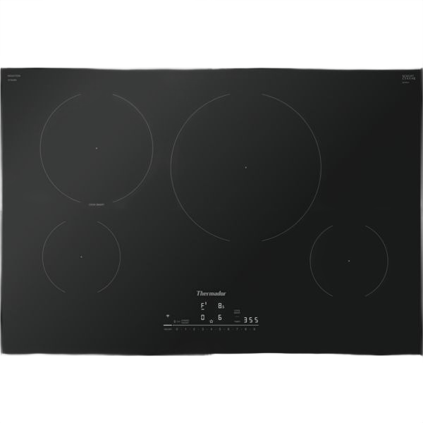 Sleek black Thermador induction cooktop with four cooking zones and touch controls, designed for precise heating in modern kitchens.