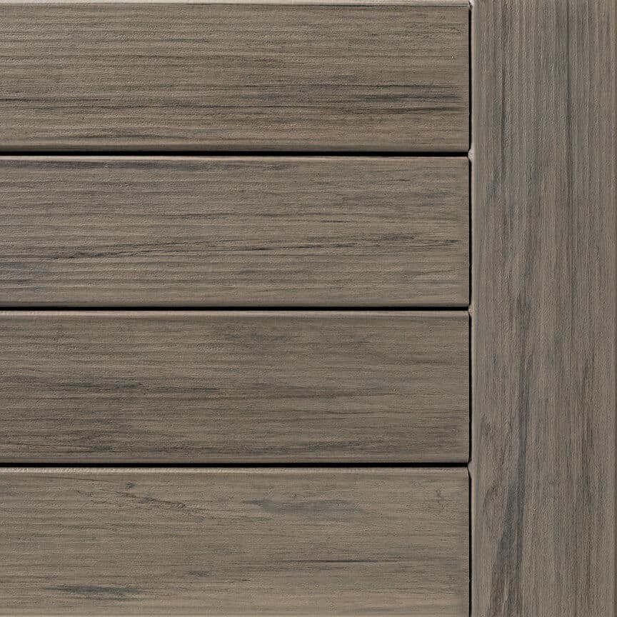 Close-up of grooved Ashwood finish decking boards from TimberTech Legacy Collection for outdoor decking projects