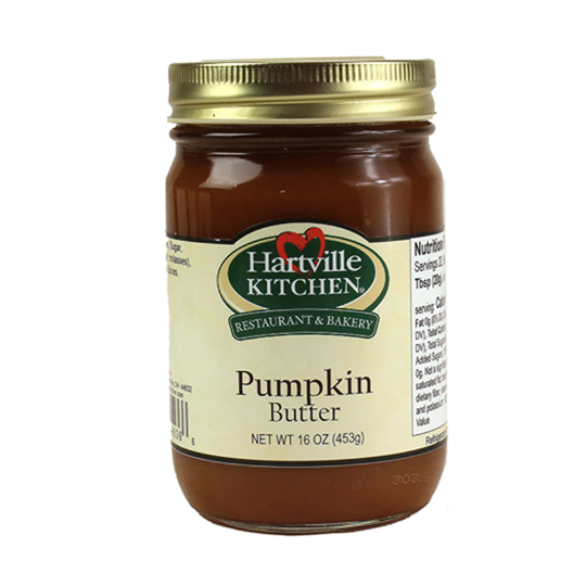 Glass jar of Hartville Kitchen pumpkin butter spread with gold lid and label under $50 in jams and jellies collection