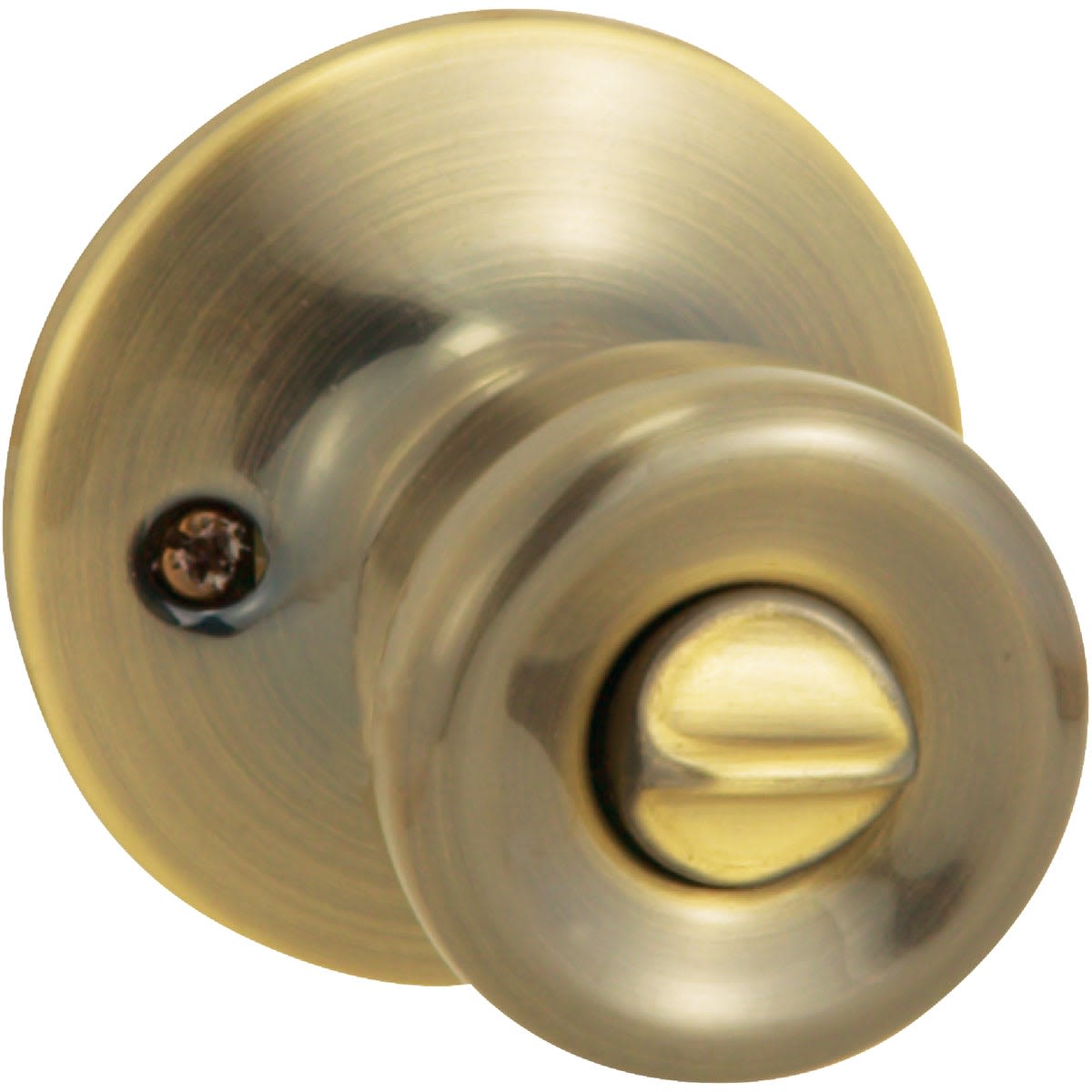 Antique brass tulip style bed and bath knob with adjustable latch for door hardware and home improvement projects
