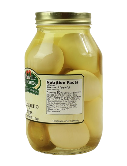 Glass jar of jalapeno-infused preserved eggs with nutrition facts in Hartville Kitchen preserved goods collection