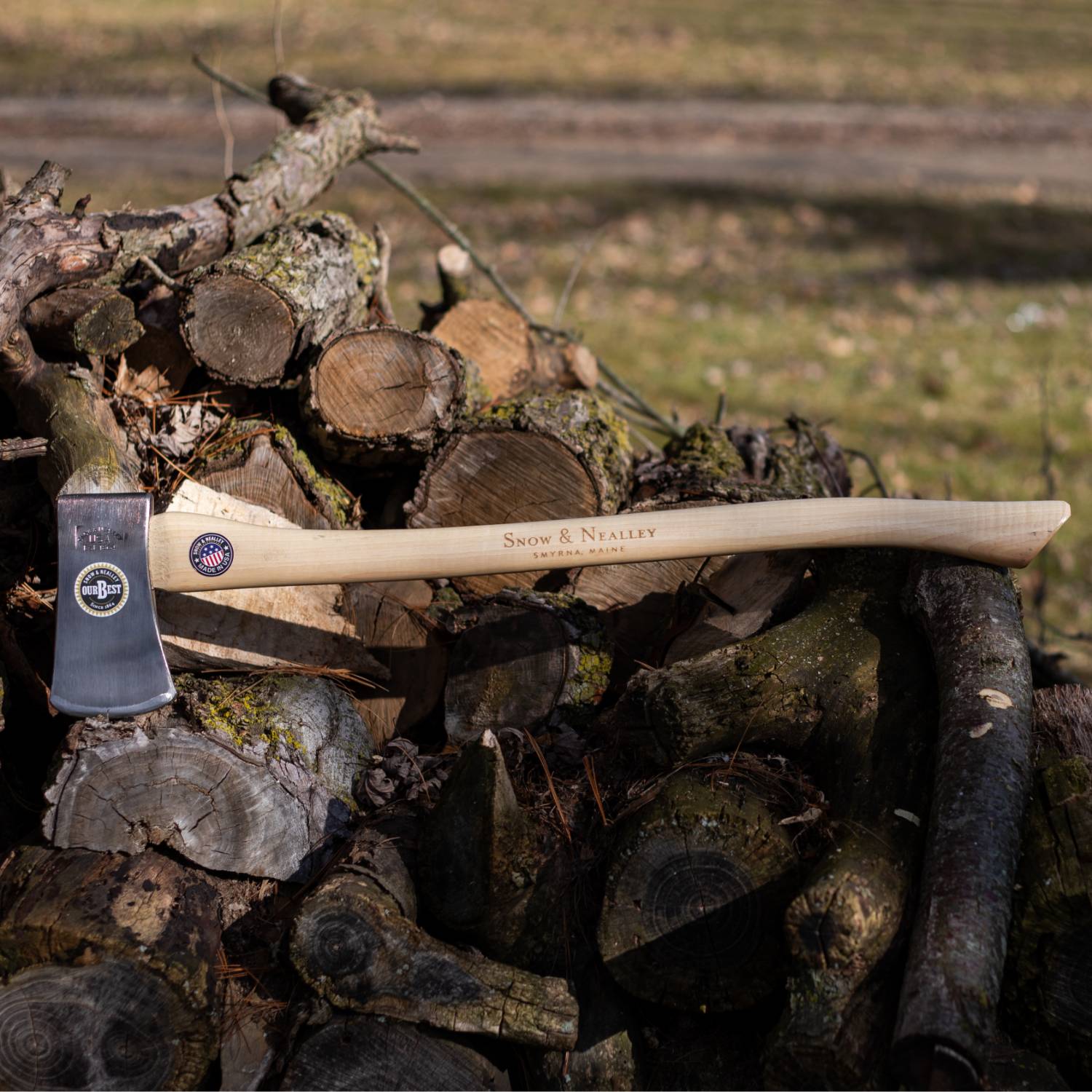 Single bit axe with smooth light wooden handle engraved with brand name for gardening and woodworking hand tools collections under 100