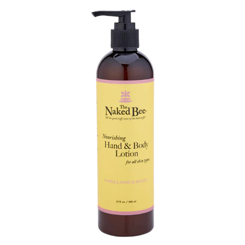 Amber pump bottle of nourishing hand and body lotion with vanilla, rose, and honey scent in skin care collections