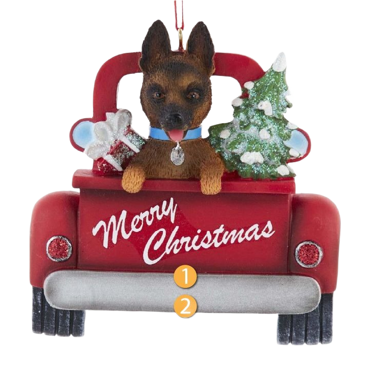 Christmas ornament featuring a German Shepherd in a red truck with gifts and a decorated tree for holiday decor