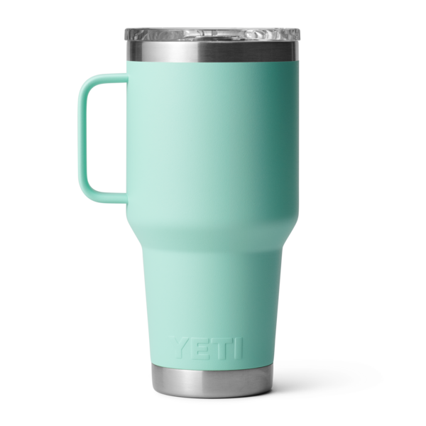 Mint green 20 oz. insulated YETI Rambler travel mug with handle and clear Stronghold lid, durable kitchen and drinkware collection