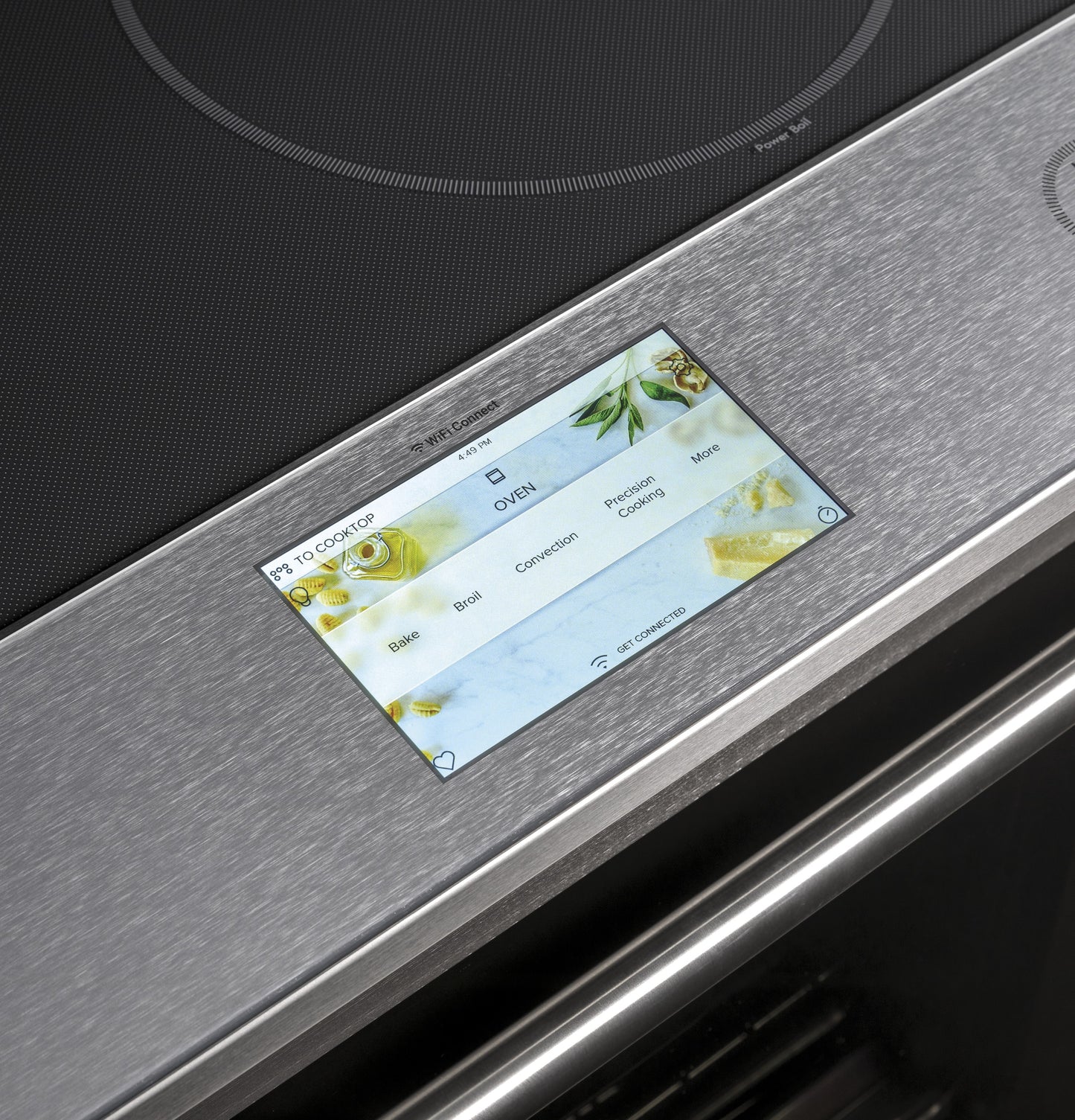 Close-up of platinum glass front control panel showing digital touchscreen interface on smart induction range