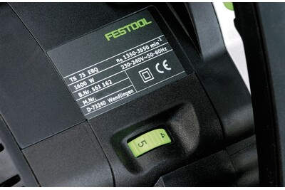 Close-up of a Festool plungecut saw with green switch and label, part of power tools and home improvement collection
