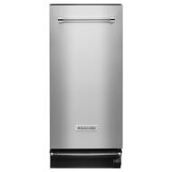 Built-in trash compactor in stainless steel with horizontal handle, part of KitchenAid kitchen appliances collection.