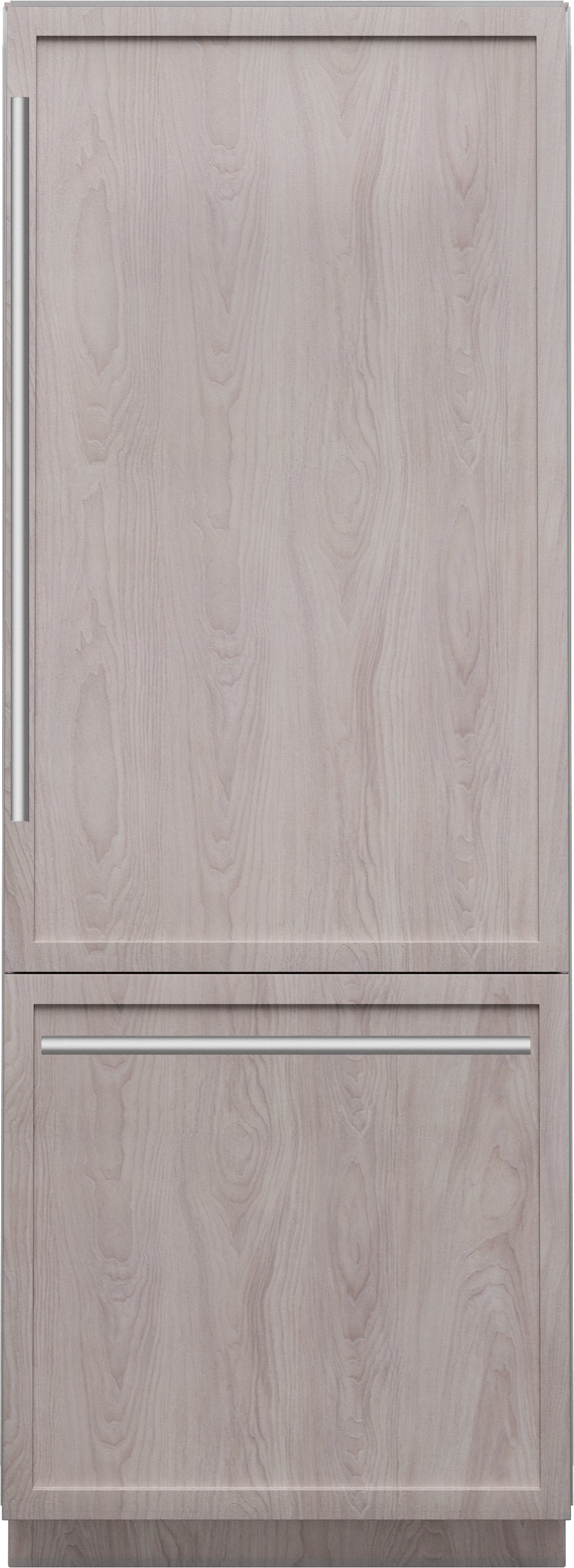 Built-in bottom freezer refrigerator with panel-ready wood finish and sleek metal handles from Thermador Appliances collection