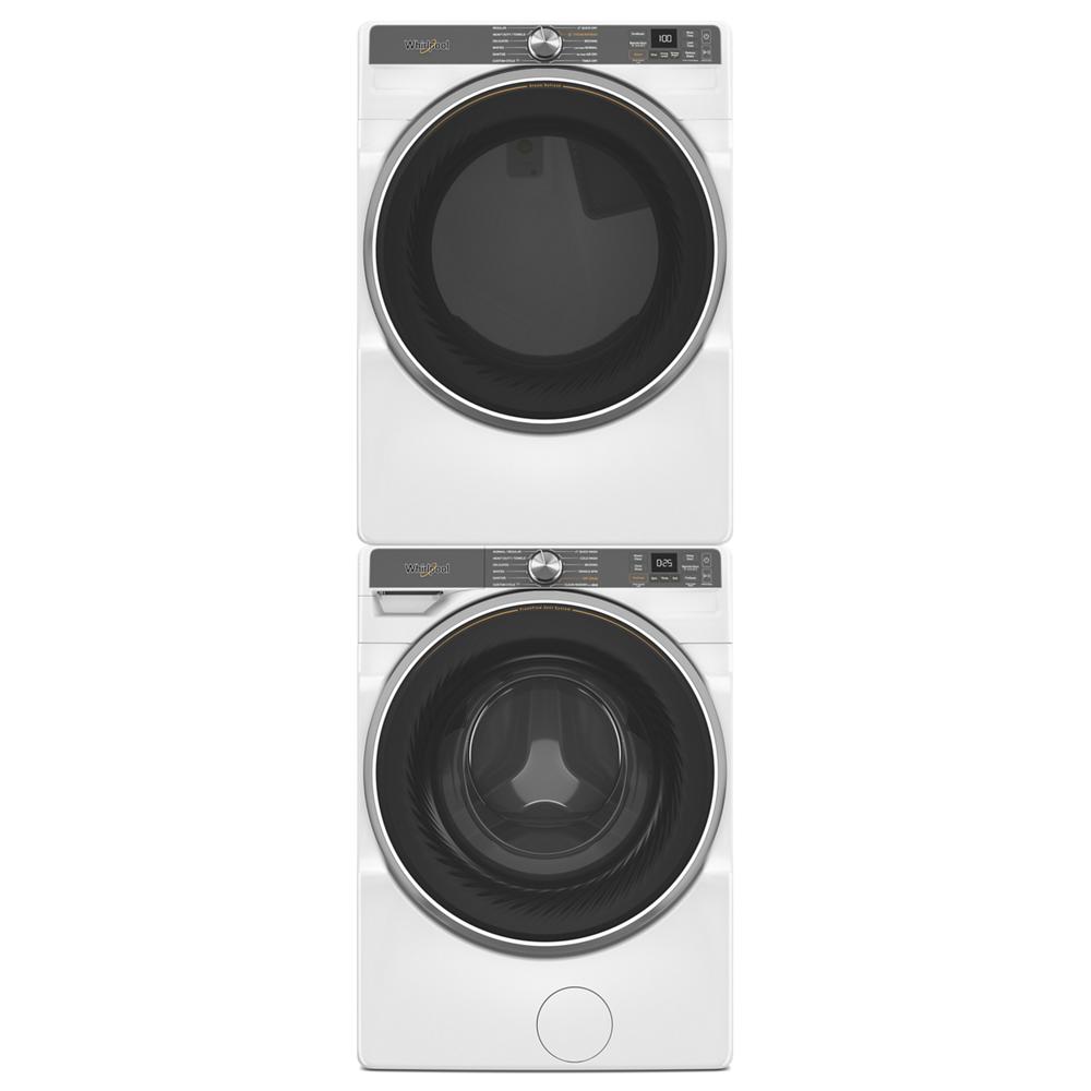 Stacked front load white washer and gas dryer pair with large round doors and digital display panels for laundry appliances collection
