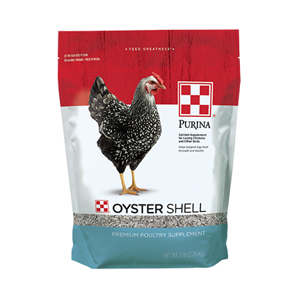 Bag of Purina Oyster Shell poultry supplement with black and white chicken image on red, white, and blue packaging