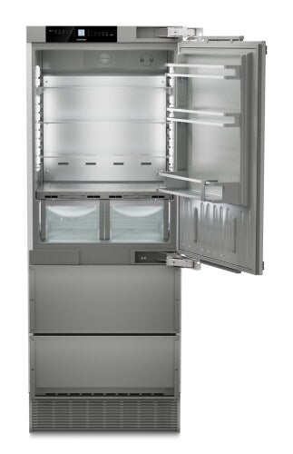 Built-in stainless steel refrigerator with right hinge door, multiple shelves, and bottom freezer in Appliances collection