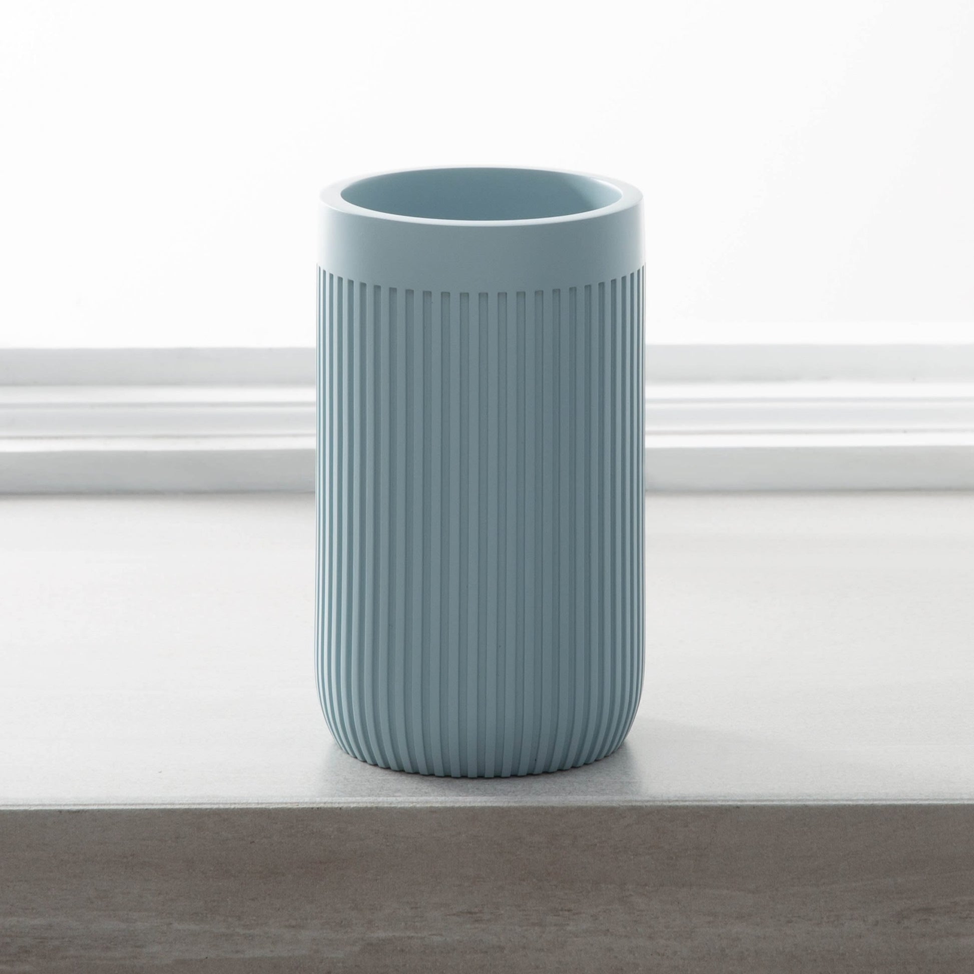 Blue ribbed resin tumbler for bathroom counter with modern design in bath and safety collections under $50