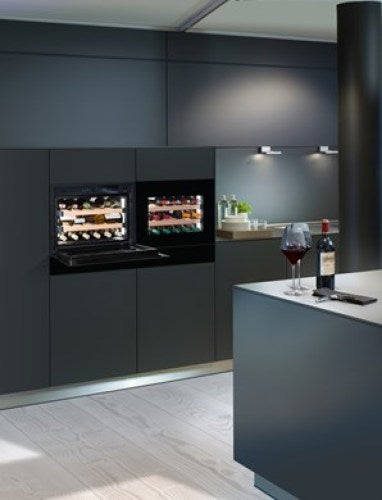 Built-in wine storage cabinet with dual compartments, wooden shelving, and sleek black finish in modern kitchen setting