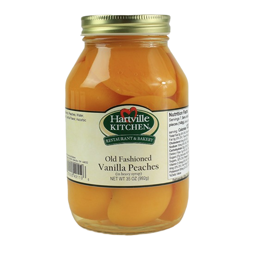 Glass jar of Hartville Kitchen Old Fashioned Vanilla Peaches in syrup from jams and jellies food collection