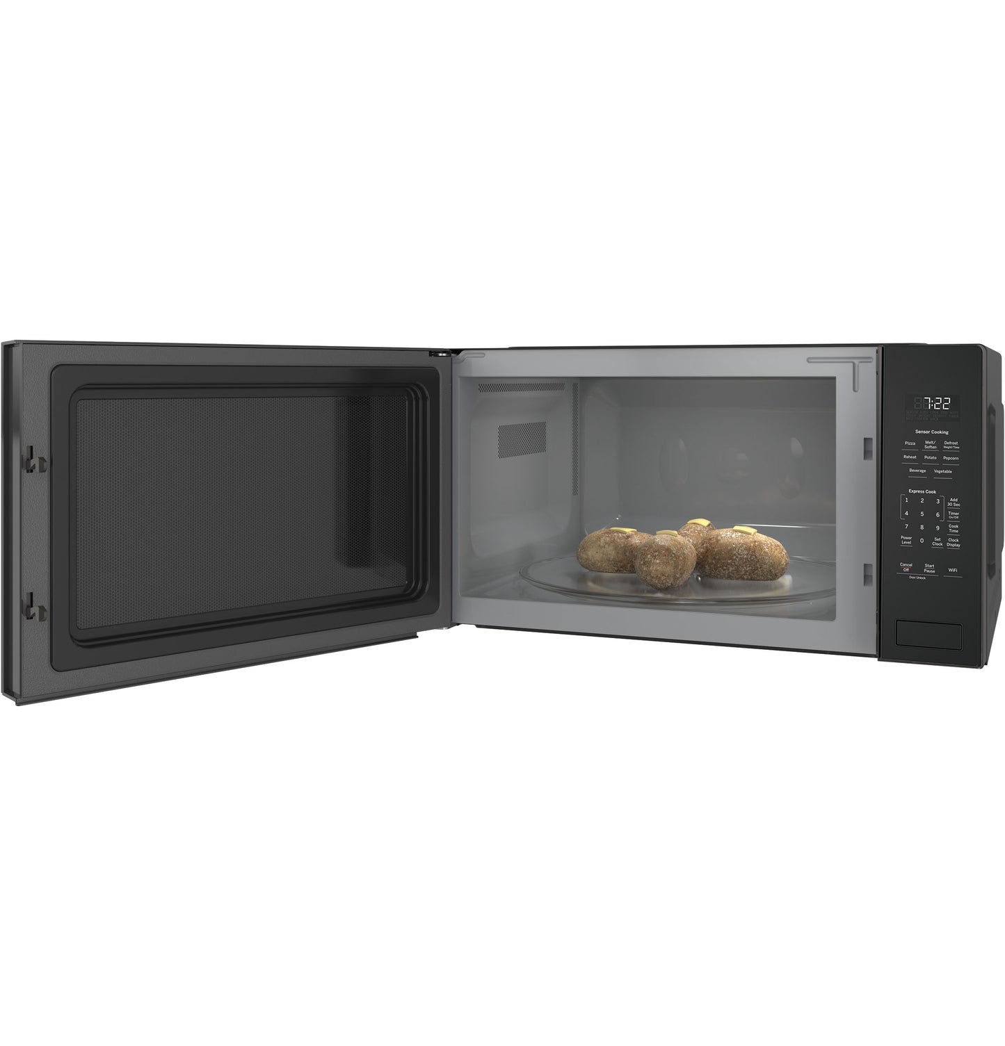 Built-in black sensor microwave oven with digital control panel cooking potatoes inside, shown open in kitchen setting