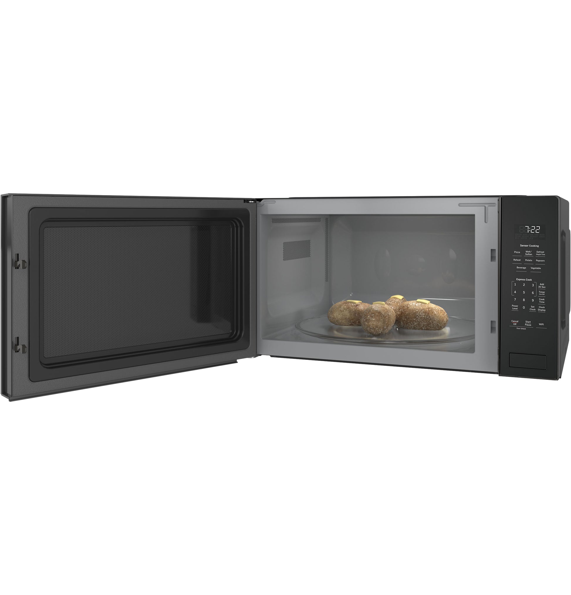 Built-in black sensor microwave oven with digital control panel cooking potatoes inside, shown open in kitchen setting