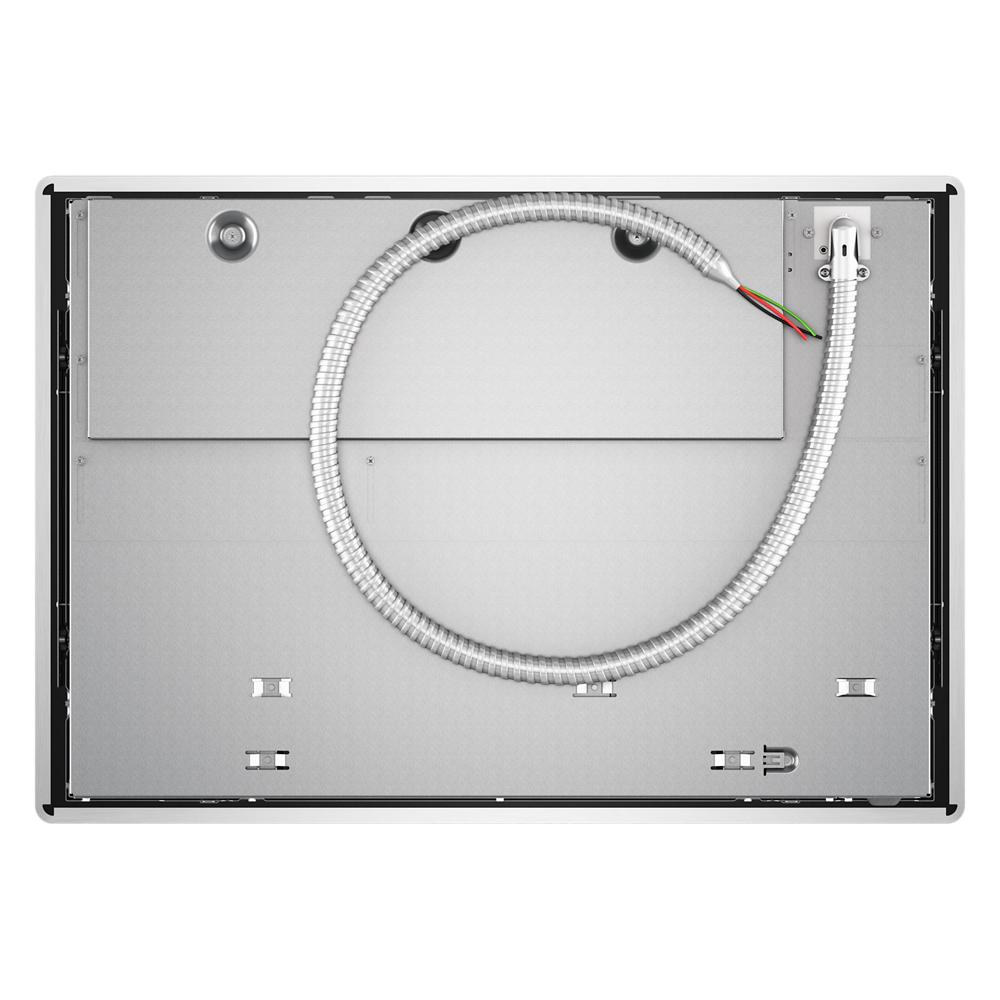 Underside view of metal induction cooktop with coiled electrical wiring and mounting points from KitchenAid Appliances collection