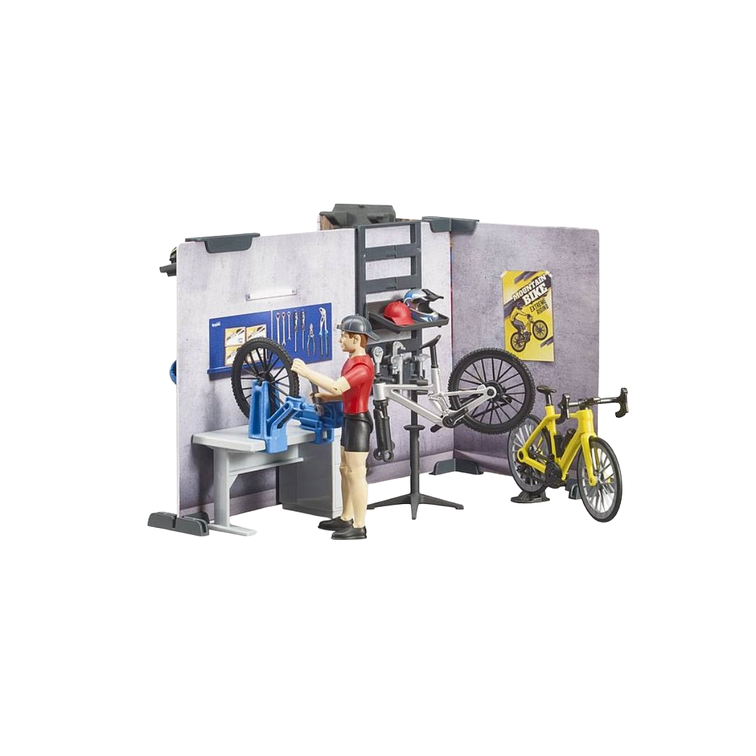 Toy bike repair shop playset with figure, yellow bike, tools, and workbench in vehicles and toys collection