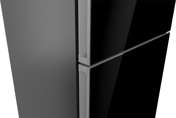 Close-up of a sleek black free-standing fridge-freezer with bottom freezer and glass door from Bosch appliances collection