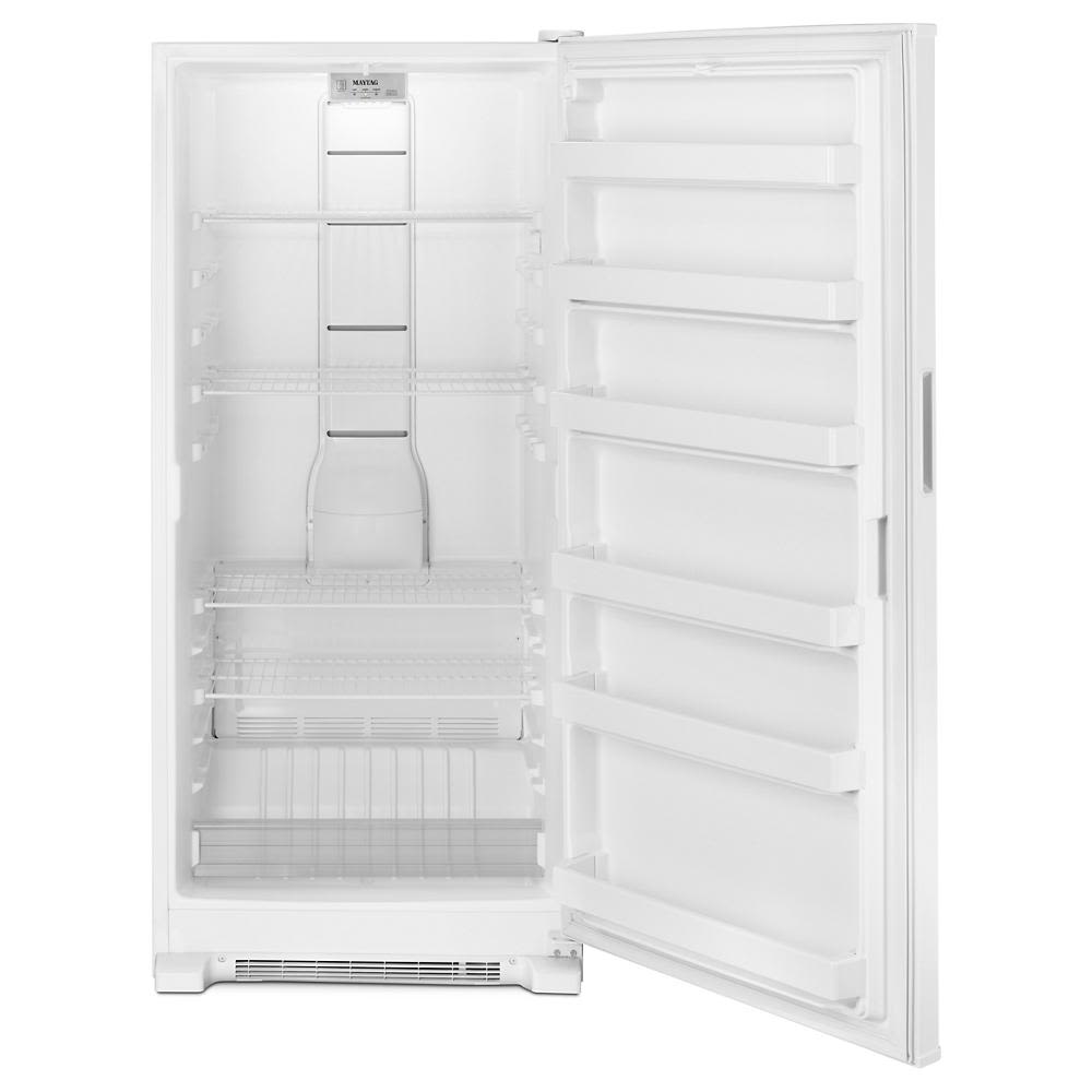 White upright freezer interior with adjustable wire shelves and door storage from Freezers & Ice Makers collection