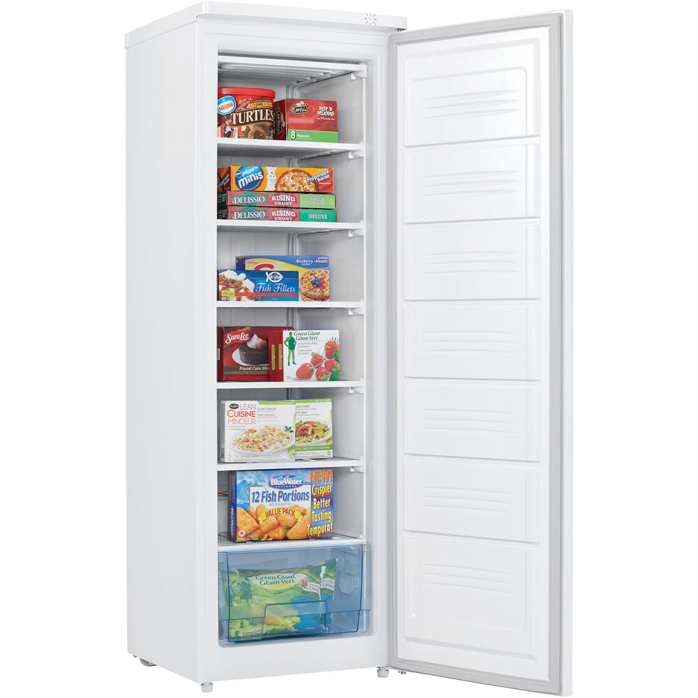 White upright freezer with multiple shelves and clear bottom drawer, ideal for kitchen and home storage needs