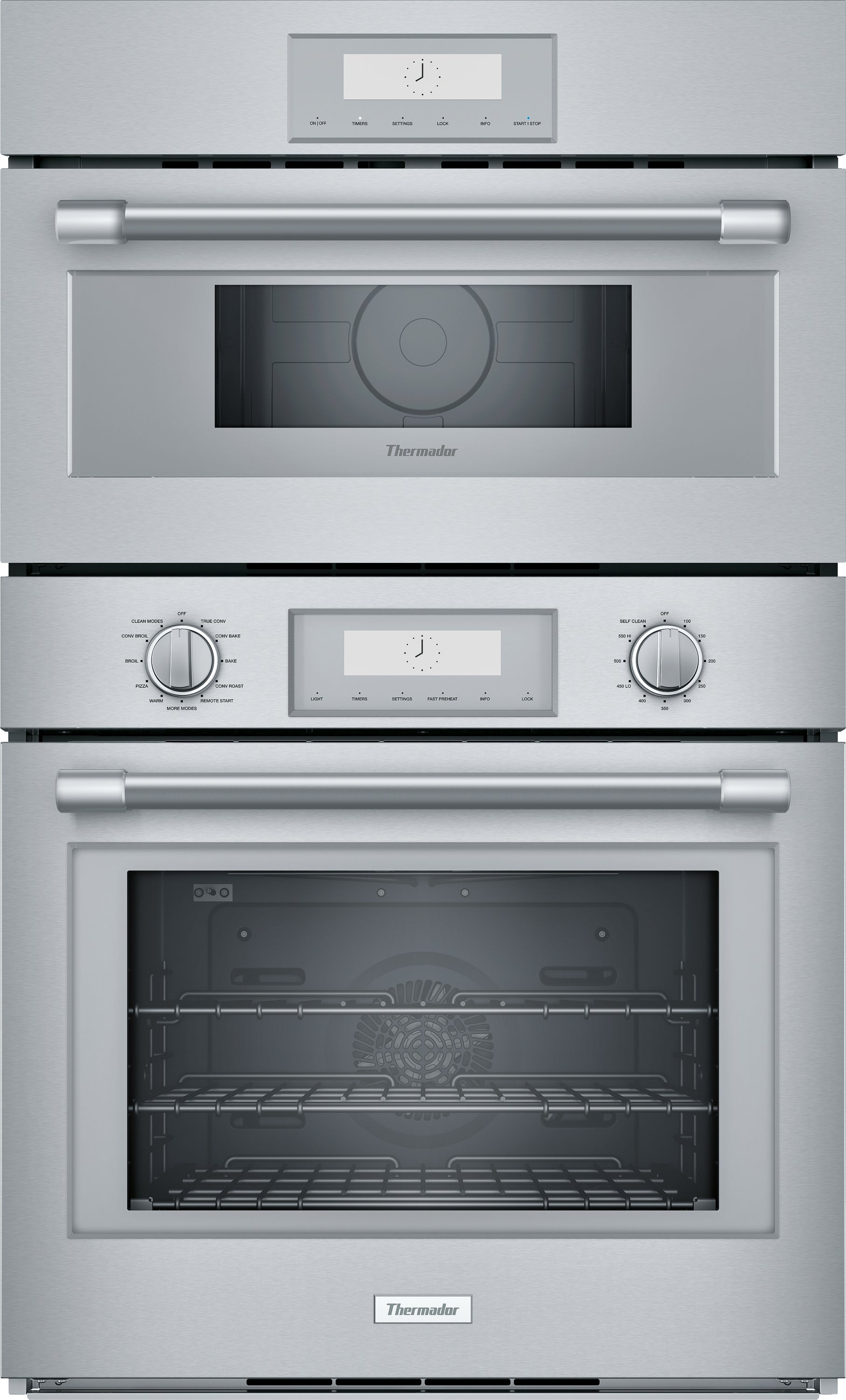 Stacked stainless steel wall ovens with digital displays, control knobs, and glass windows from Thermador kitchen appliances collection