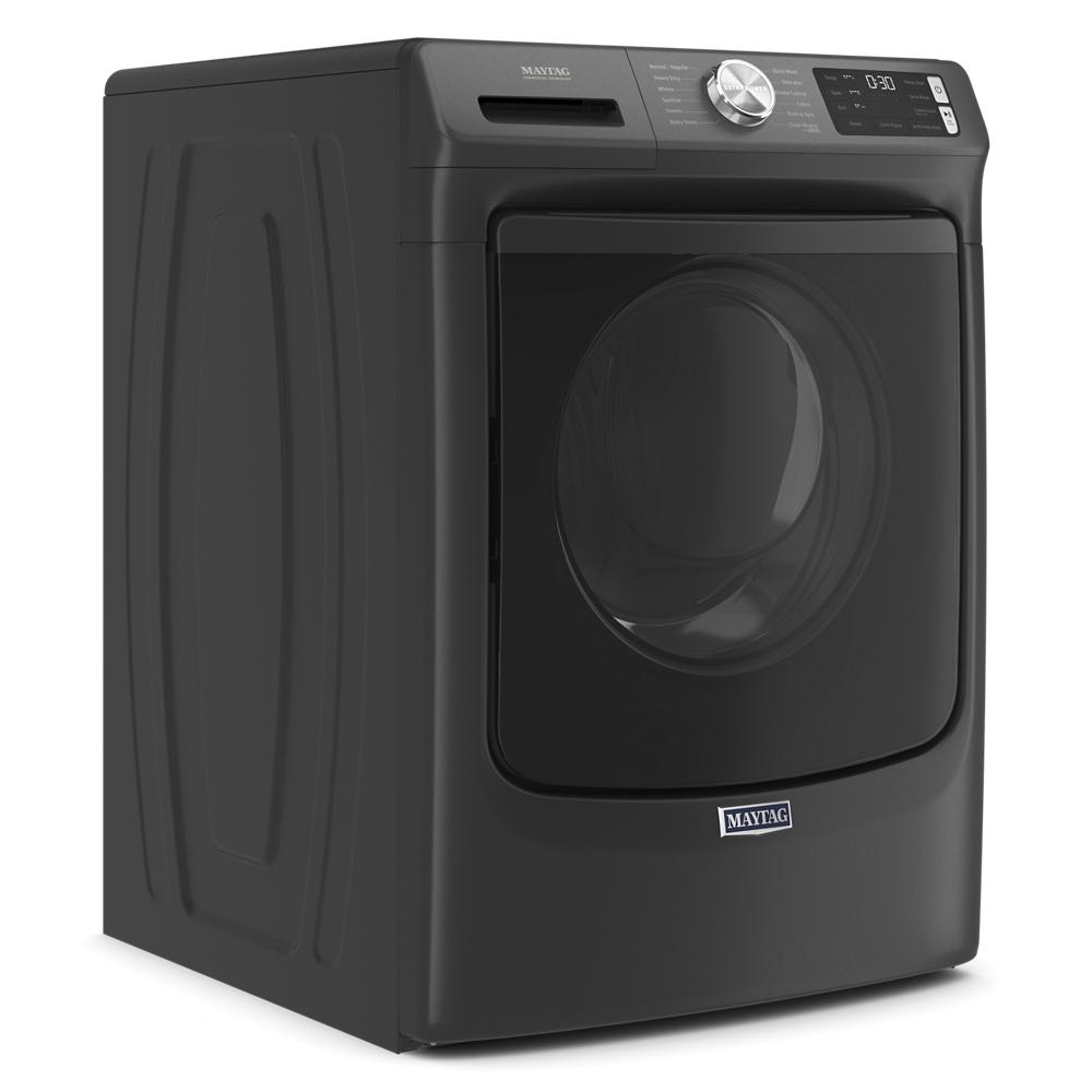Black front load washer with digital controls and large glass door, part of modern washers and dryers collection.