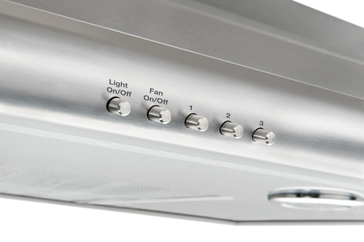 Close-up of brushed stainless steel overhead range hood control panel with fan speed settings and light switch in kitchen appliances collection