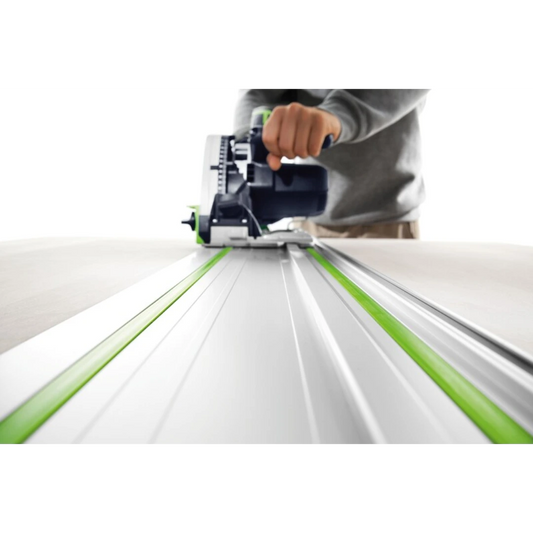 Person guiding a power saw along a Festool aluminum guide rail for accurate woodworking straight cuts