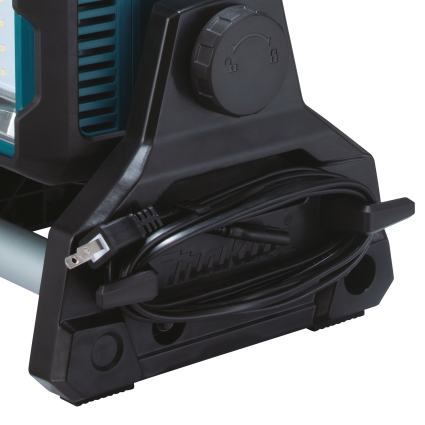 Close-up of black cord storage on Makita 18V LXT cordless and corded work light for home improvement tools collections