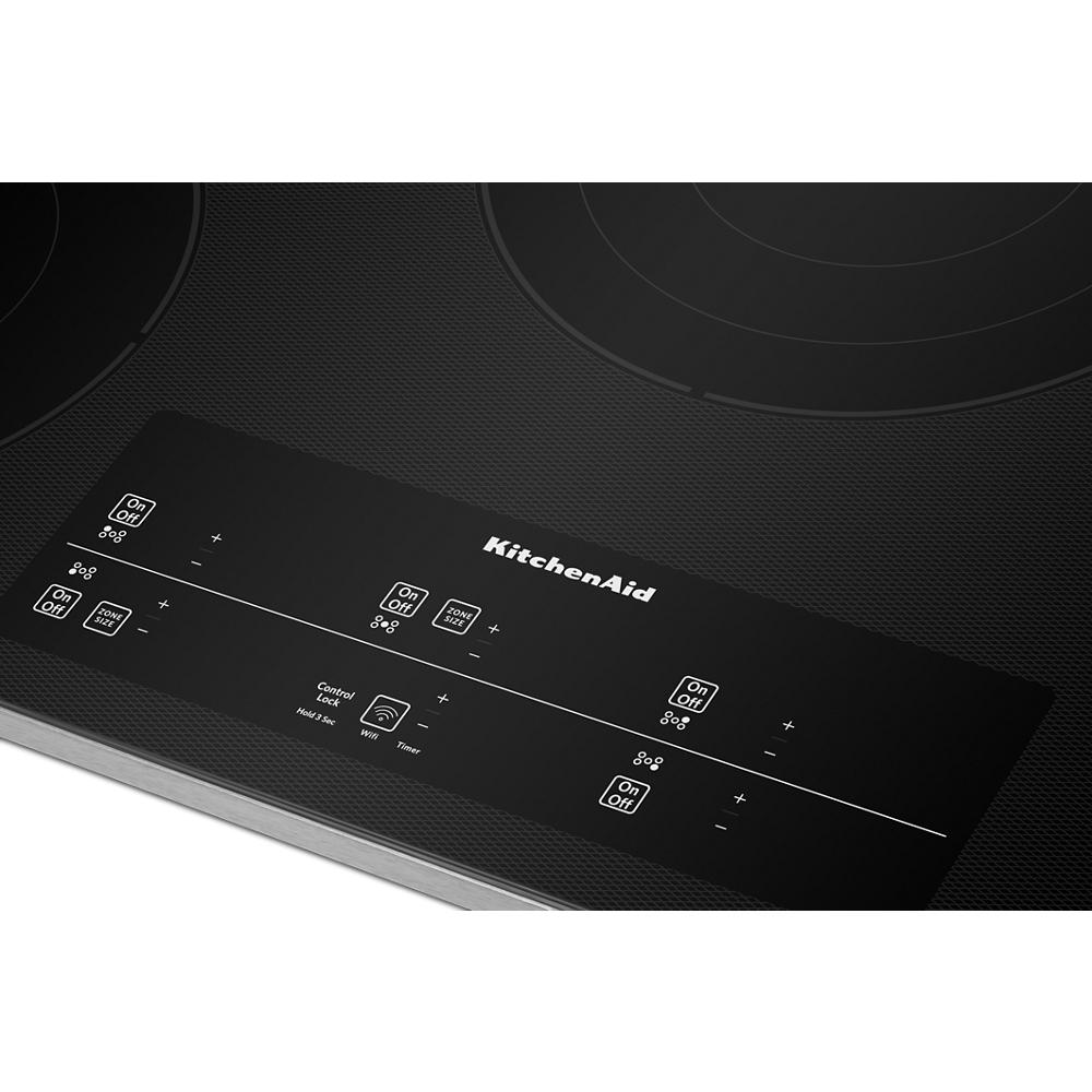 KitchenAid black glass cooktop panel with five touch-activated heating elements controls from kitchen appliances collection