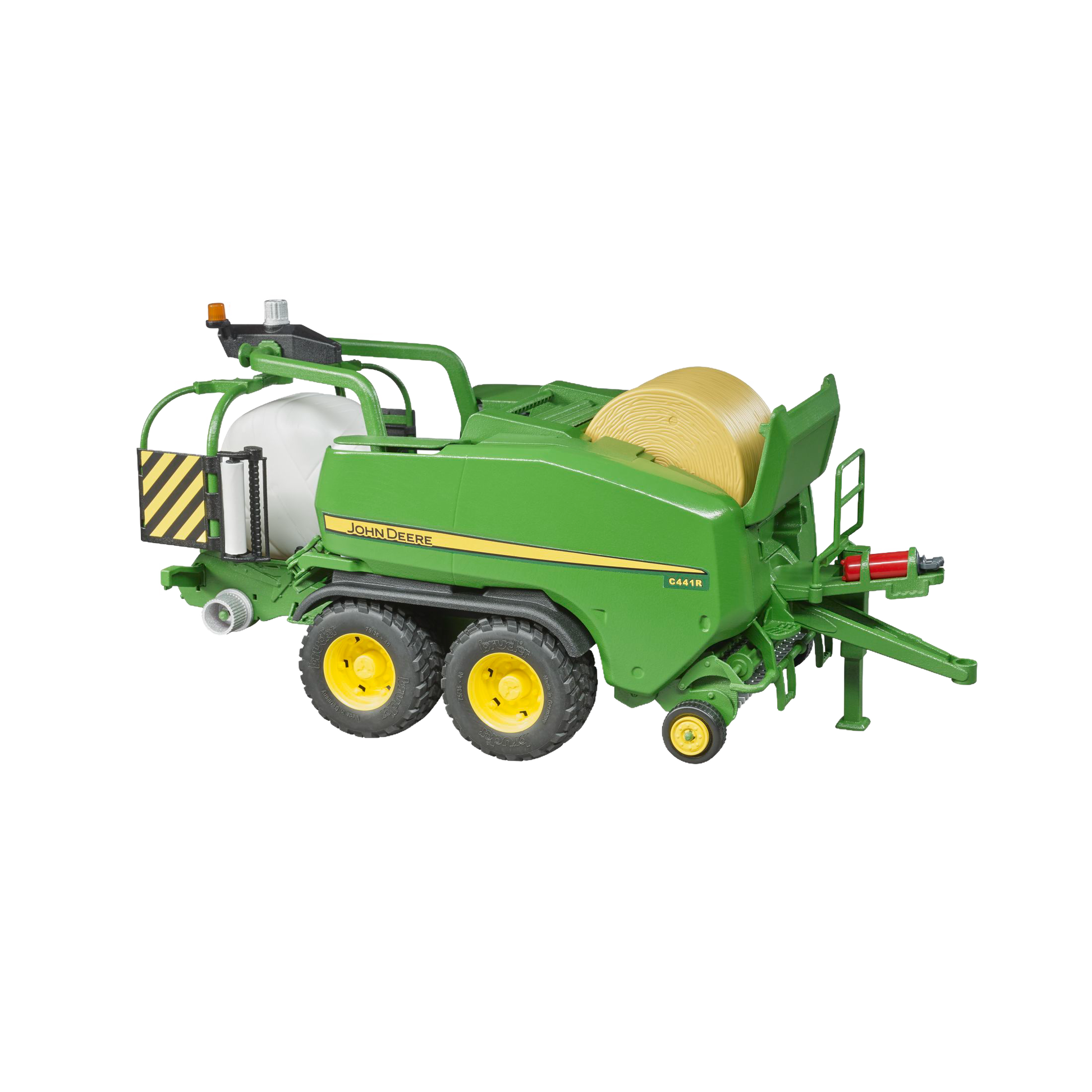 Green and yellow toy baler with round bale detail from Bruder Toys in Vehicles & Remote Controlled Toys collection