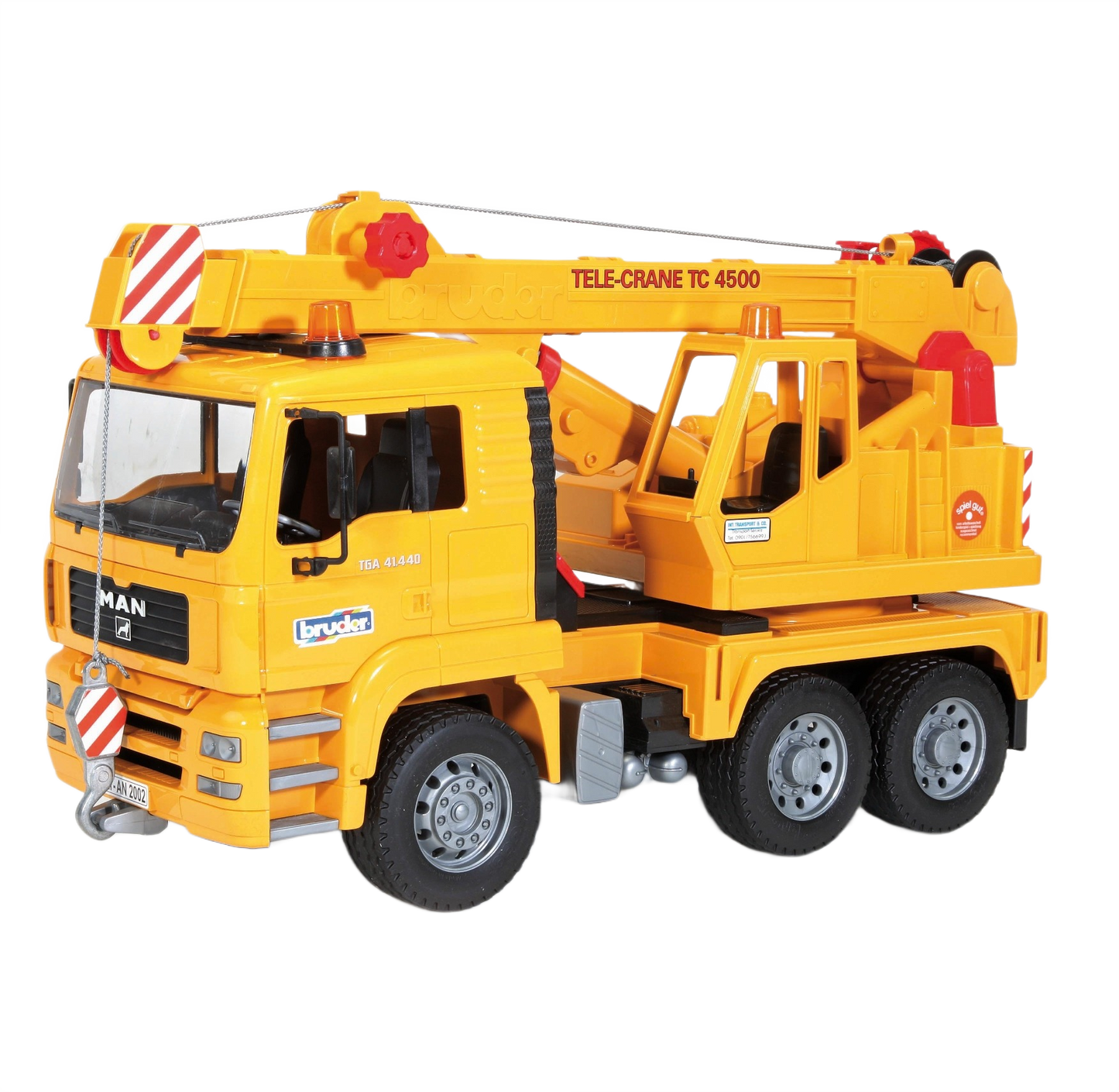 Yellow Bruder Toys MAN crane truck with extendable arm and detailed cab for realistic construction play