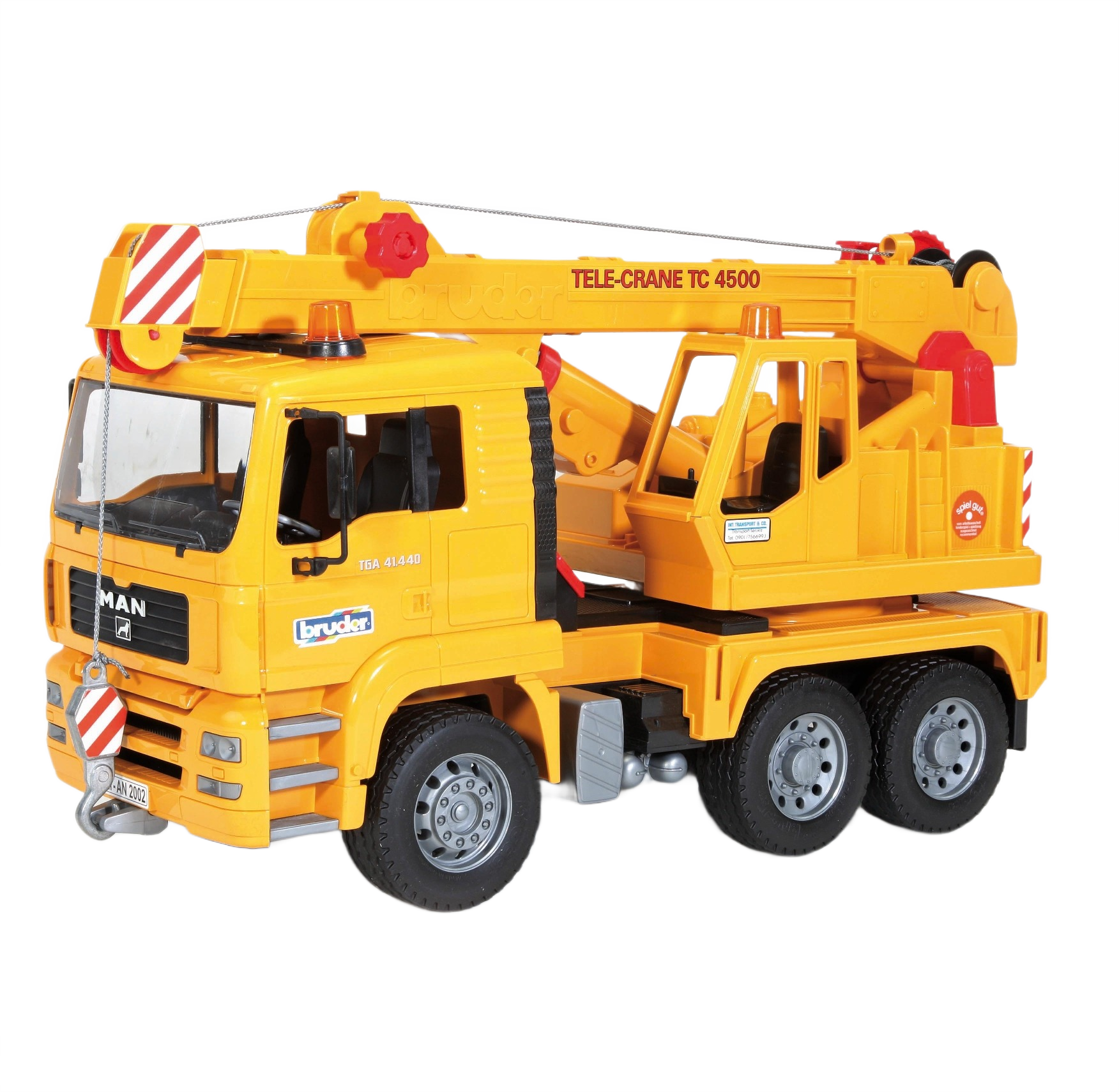 Yellow Bruder Toys MAN crane truck with extendable arm and detailed cab for realistic construction play