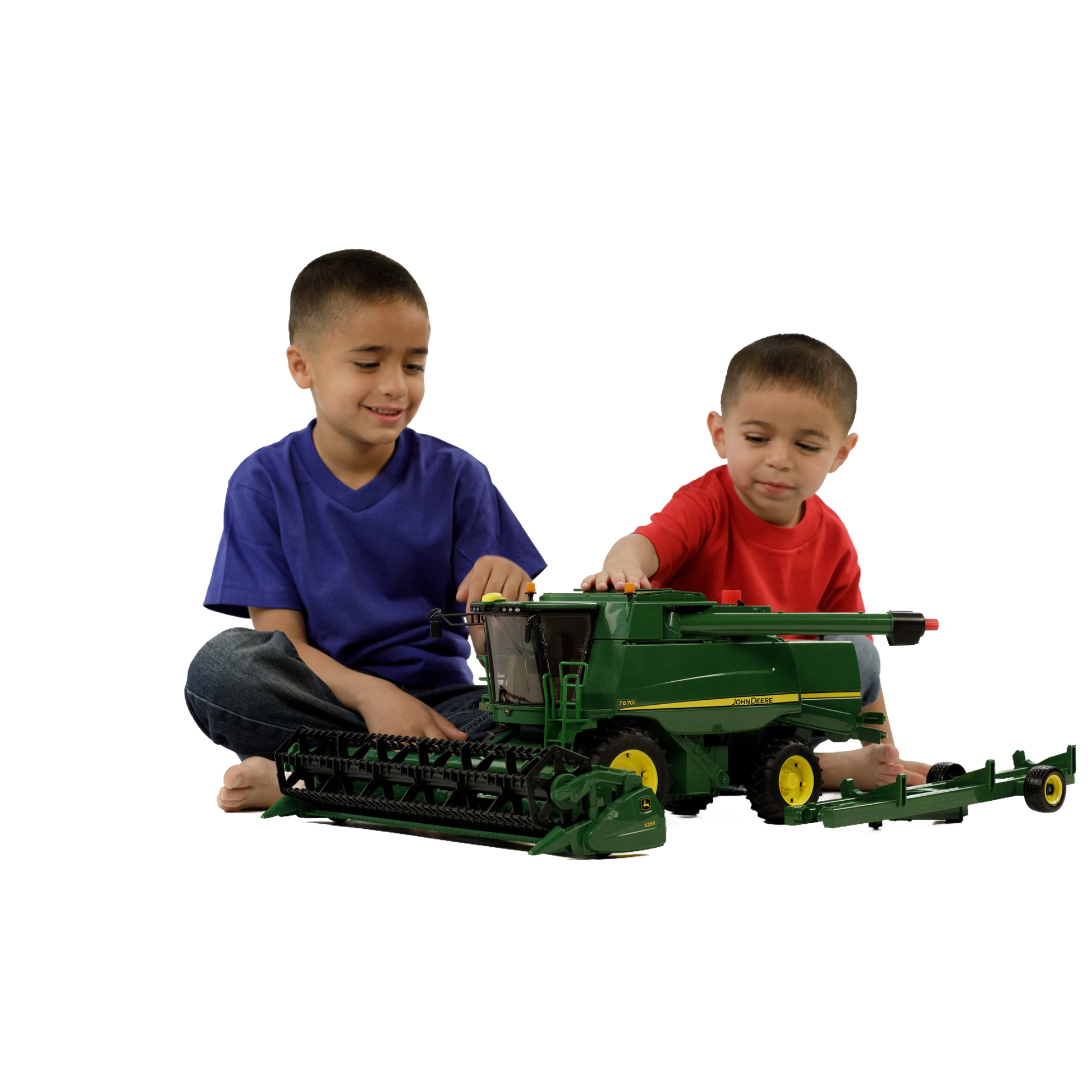 Two boys playing with a green Bruder John Deere T670i combine harvester toy in Vehicles & Remote Controlled Toys collection