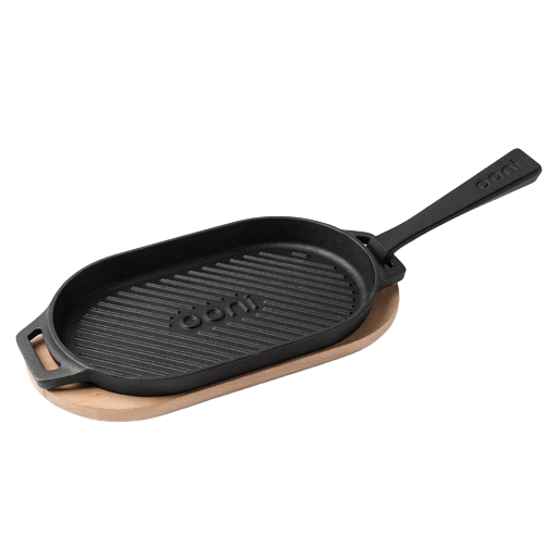 Cast iron grizzler pan with removable handle on wooden tray for grilling accessories and outdoor living collections under $100