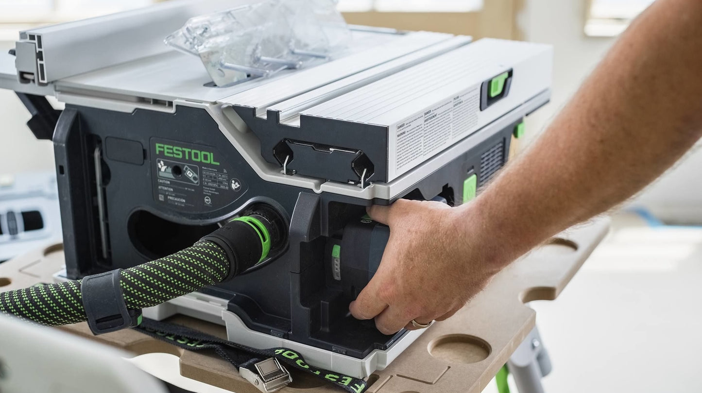 Hand adjusting a compact cordless table saw from Festool, part of battery-powered power tools and saws collection