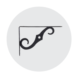 Ornate black metal corner bracket with decorative scrollwork and a central mounting hole, displayed on a light circular background.