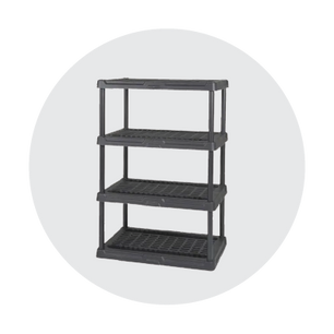 Four-tier black plastic shelving unit with ventilated flat shelves supported by vertical corner posts, shown against a light circular backdrop