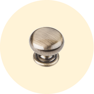 Round brushed metal cabinet knob with a slightly domed top and circular base displayed on a soft beige background.