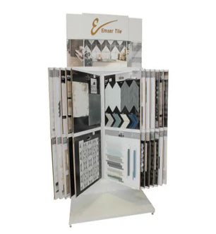 Rotating display stand featuring multiple tile sample panels with various geometric patterns and neutral colors for home improvement projects.